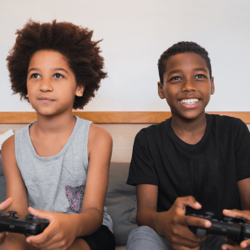 Kid creating a game world in Kiddo Studio